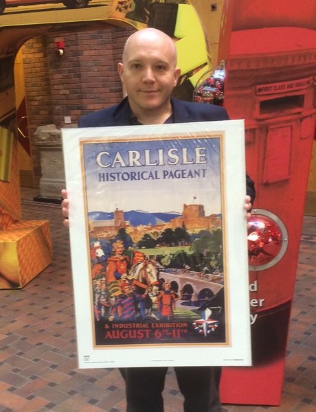 The author with a print of the 1951 pageant poster. Note the Festival of Britain symbol in the bottom right-hand corner.