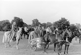 Boudica (played by Brenda Swinson) in her scythe-wheeled chariot, with entourage, in the 1953 St Albans pageant